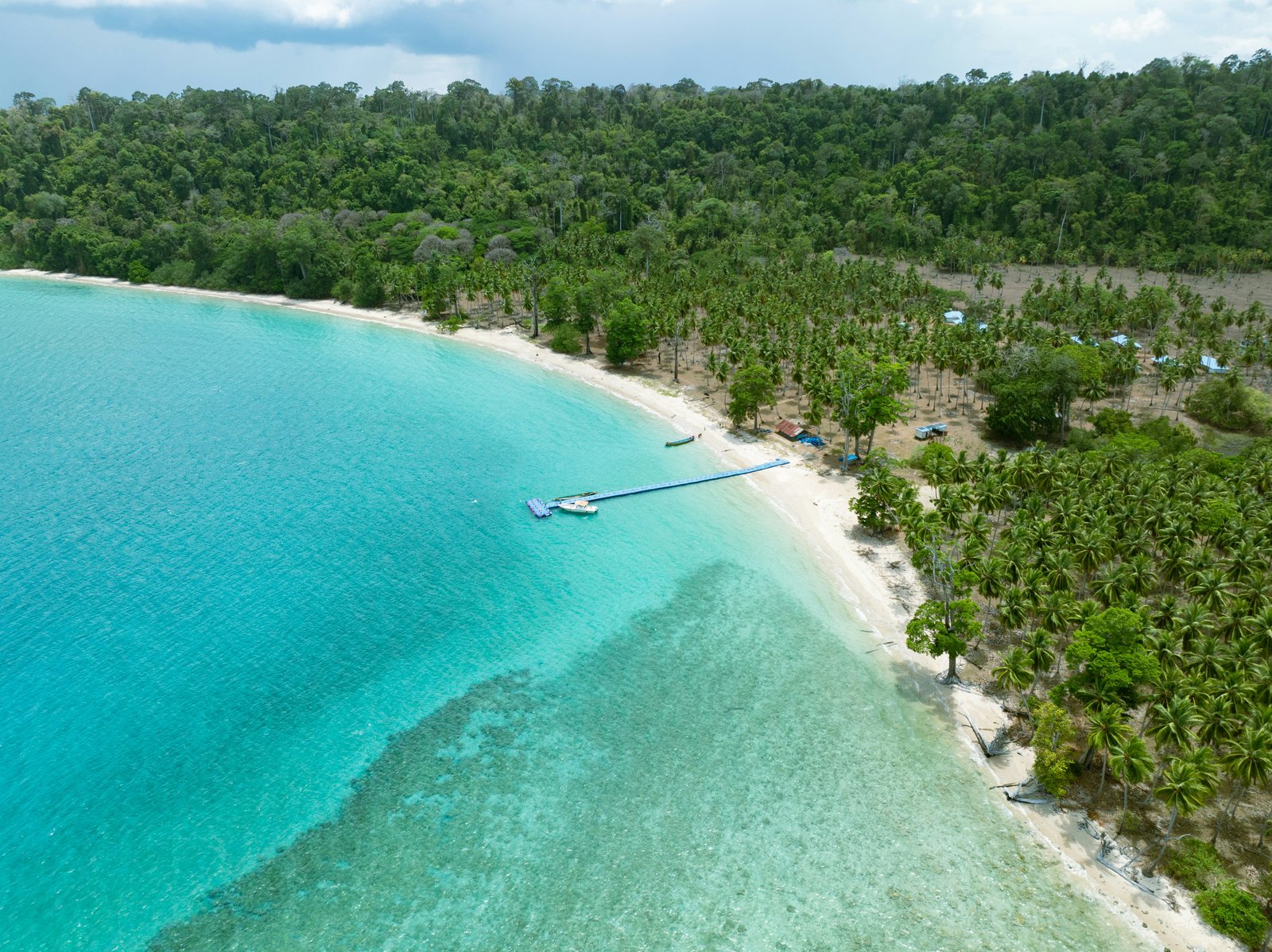 Ocean waves around a tropical island